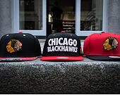 Kšiltovka Mitchell & Ness Chicago Blackhawks Splatter Black/Red Snapback