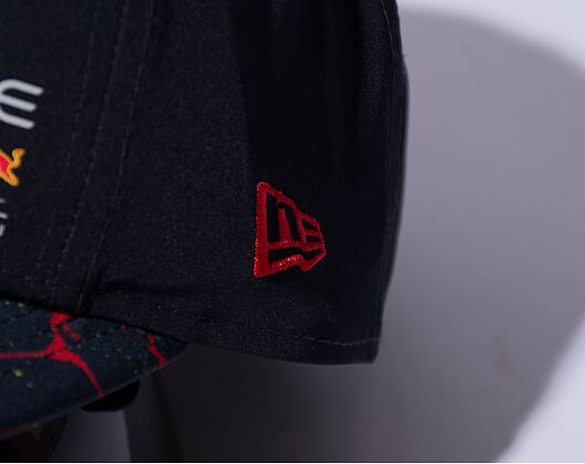 Kšiltovka New Era 9FIFTY All-Over-Print VSR Red Bull F1 Night Sky Navy